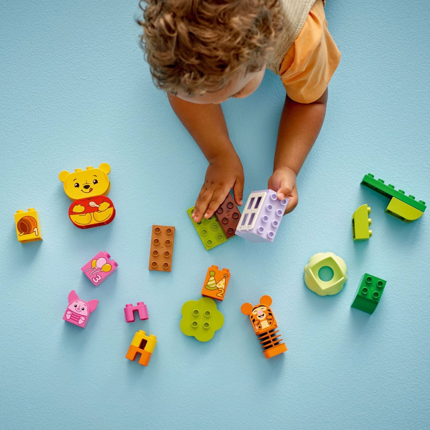 LEGO DUPLO ディズニー くまのプーさんの誕生日パーティーおもちゃ、22 個。